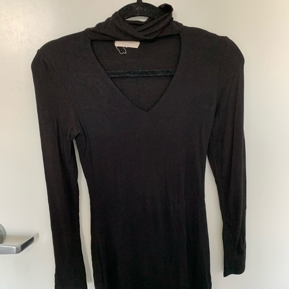 Dresses & Skirts - black body con with a turtle neck but open v neck